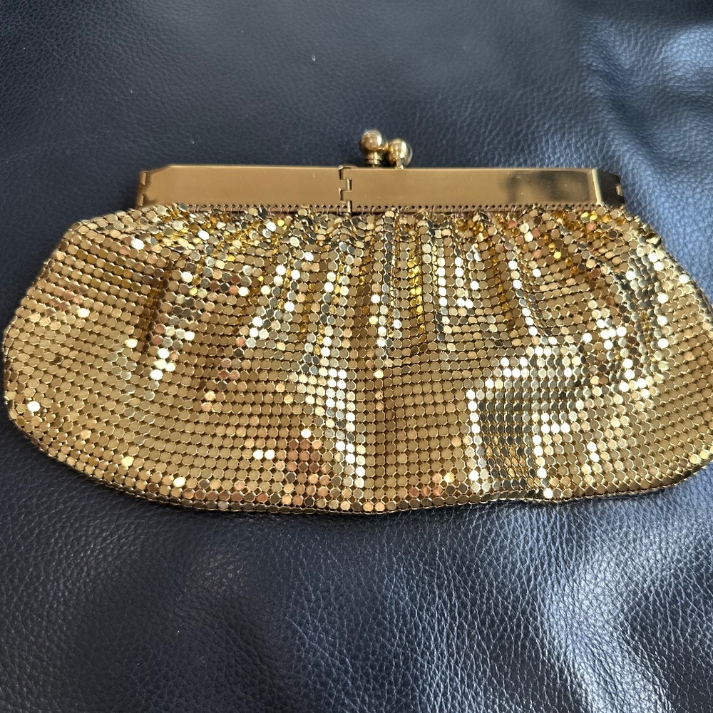 Small and shiny party clutch